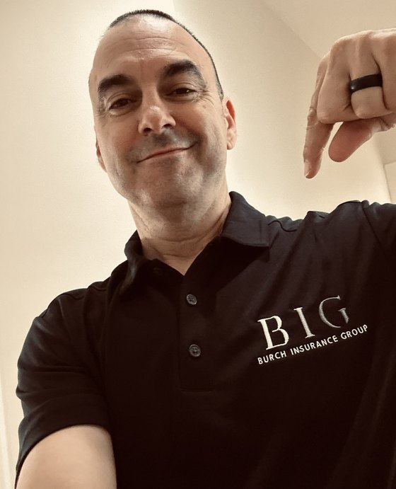 Darren Burch wearing a Burch Insurance Group polo