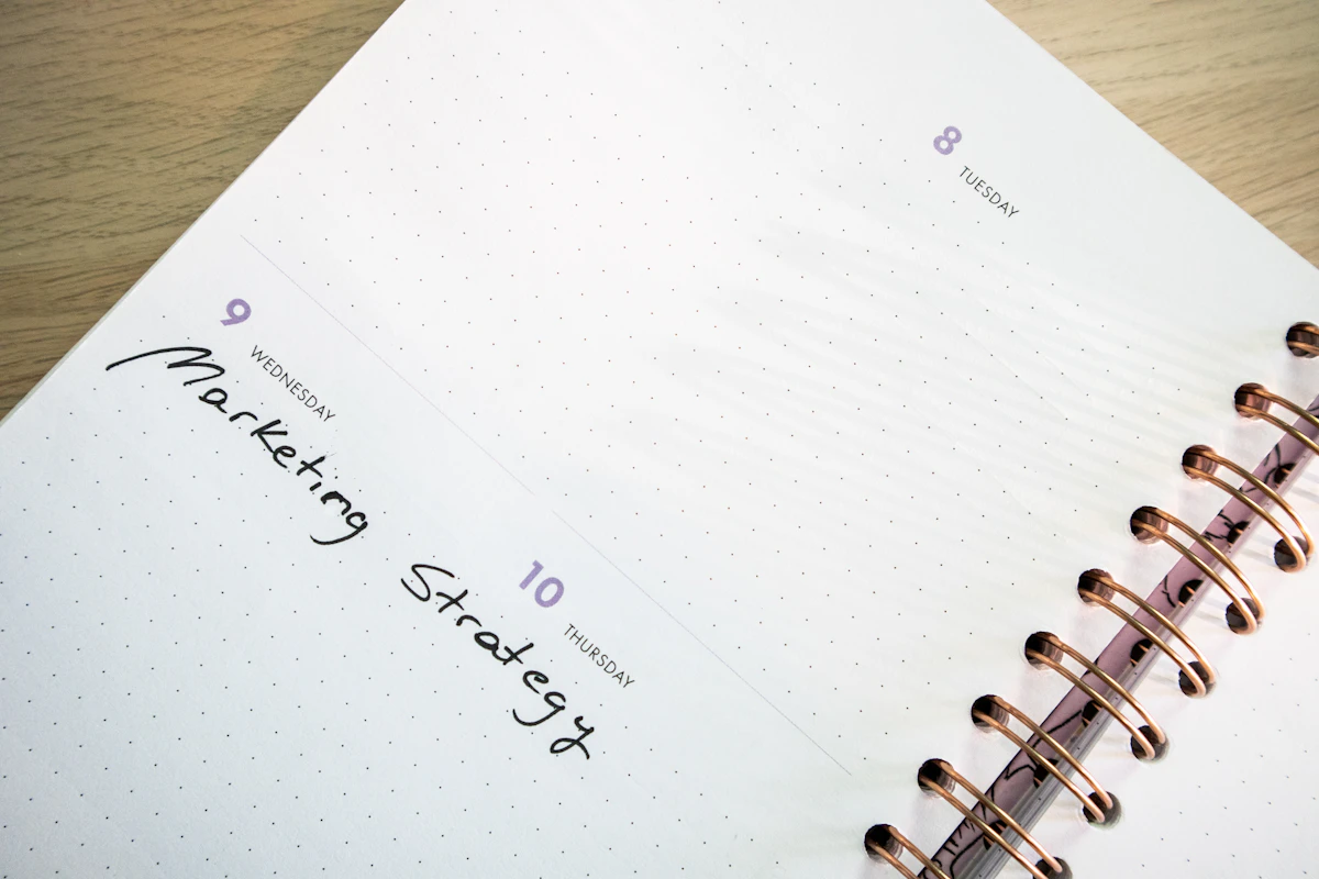 Notebook open to a marketing strategy plan
