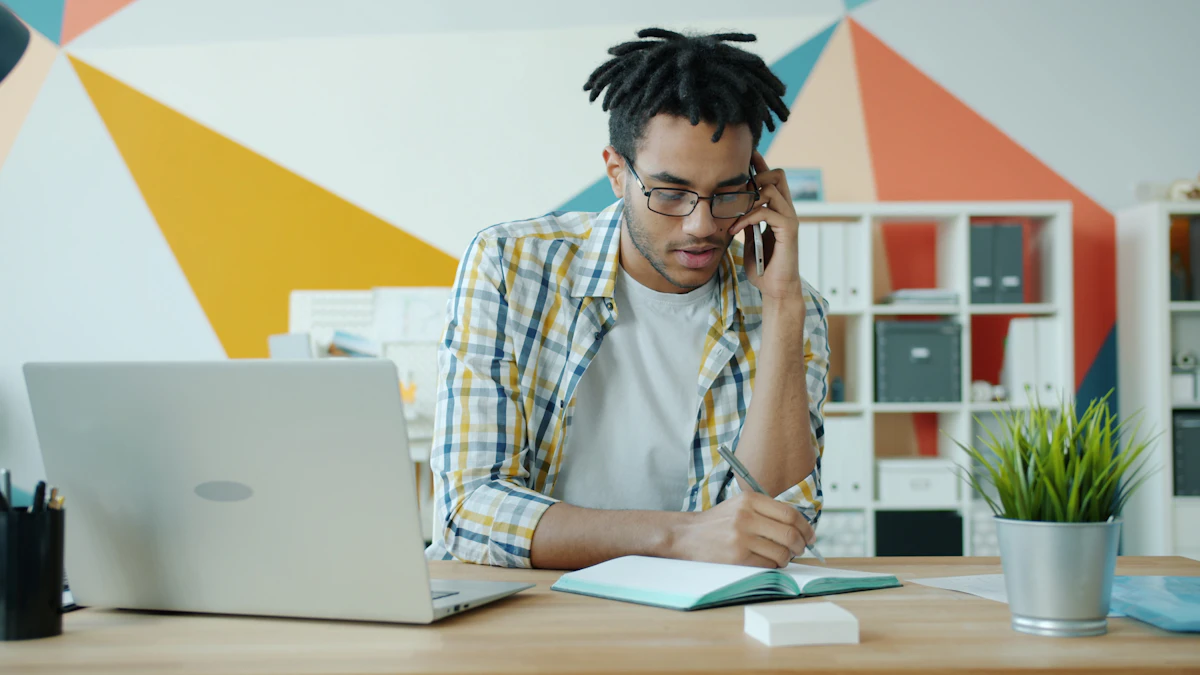 Professional taking notes during a phone conversation
